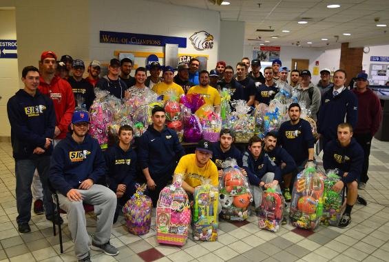 Baseball and Campus Services Donate Easter Baskets to Community Centers