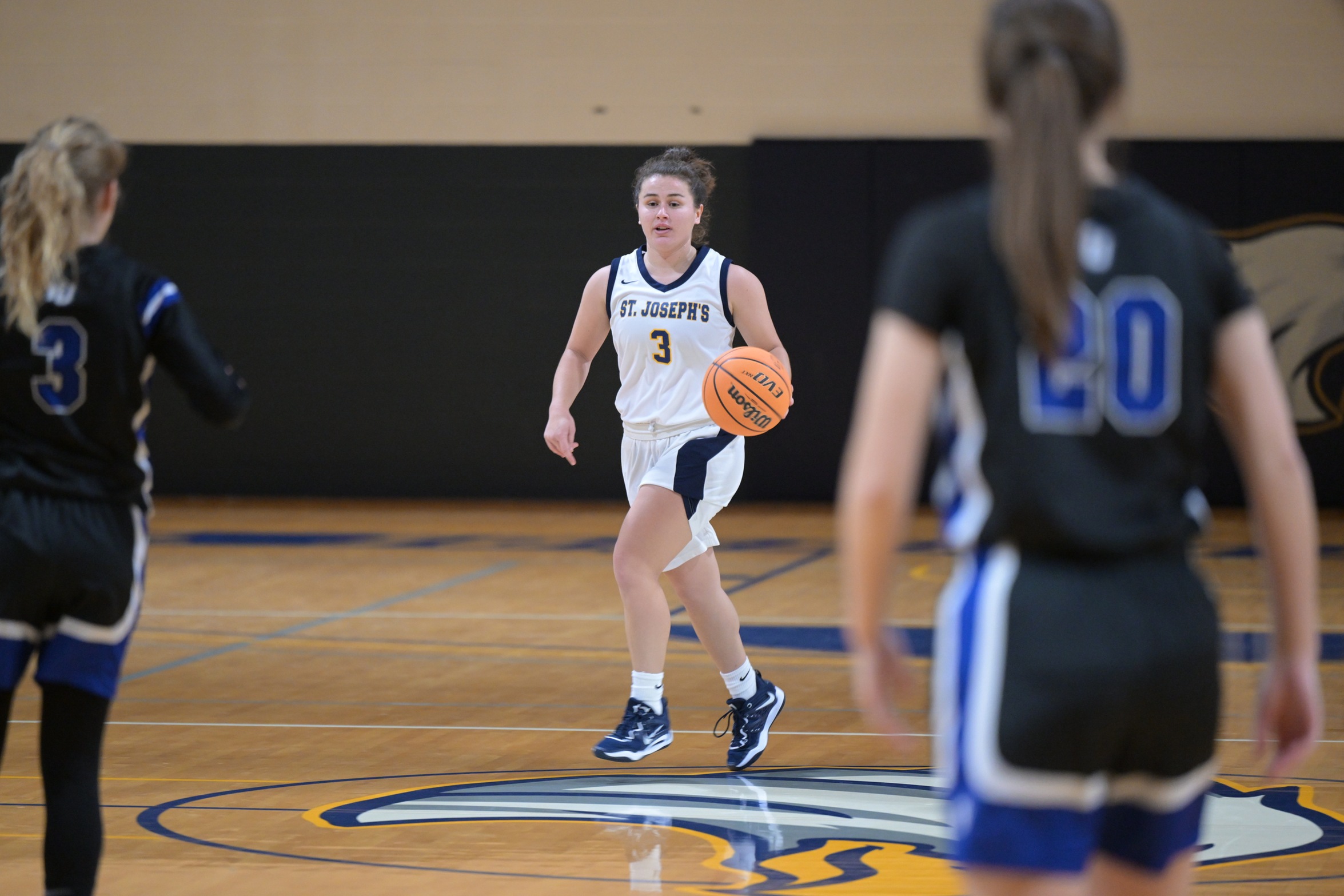 Strong Fourth Quarter Propels Women's Basketball to Victory